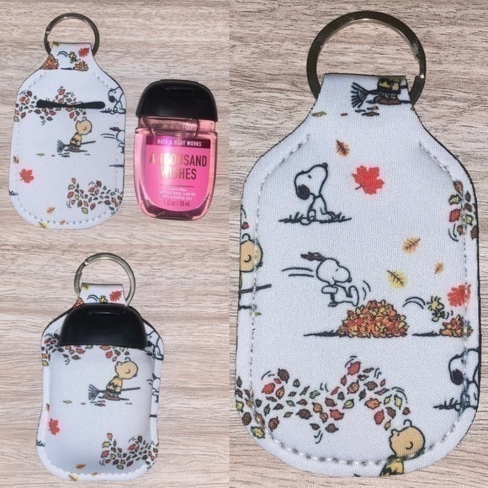 Peanuts snoopy fall is in the air hand sanitizer holder new